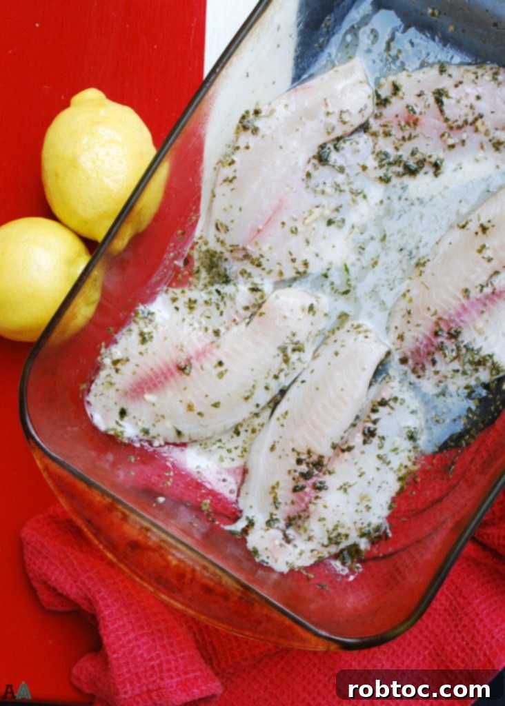 Close-up of baked Lemon Garlic Tilapia fillets, perfect for quick dinners