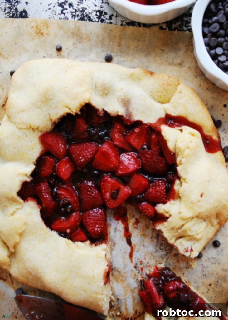 Vegan Top 8 Allergen-Free Strawberry Chocolate Galette 3 Freshly baked Strawberry Chocolate Galette cooling, showcasing its beautiful, free-form crust and vibrant fruit filling, an ideal allergy-friendly treat.