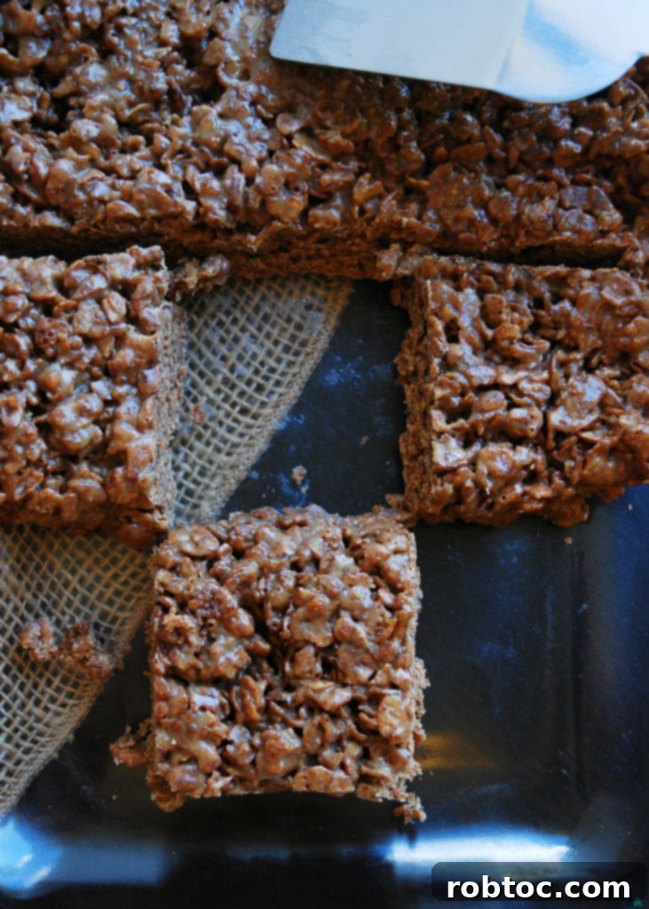 Inside Out Scotcheroos cut into squares, ready to be served as an allergy-friendly and delicious snack for any occasion.