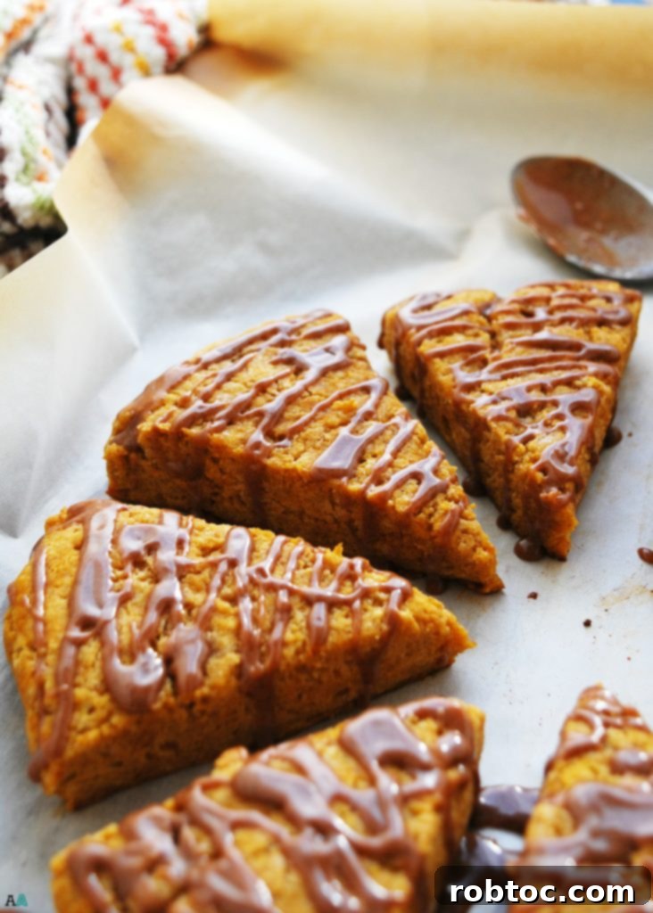 Delectable Top 8 Free Vegan Pumpkin Scones with Spiced Glaze 3 Warm Pumpkin Scones with Cinnamon Glaze, perfect for allergy-friendly breakfast