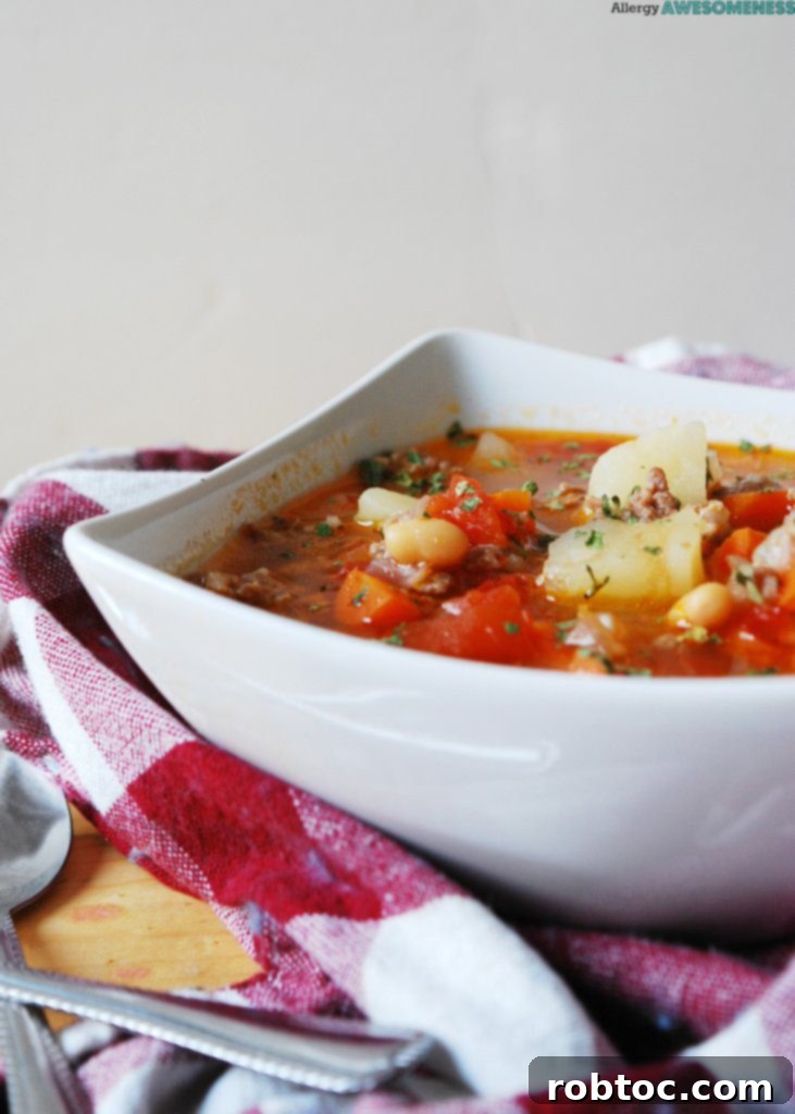 Slow Cooker and Instant Pot Potato and Sausage Soup 3 Hearty Potato and Sausage Soup, free from gluten and dairy. A perfect allergy-friendly dinner.