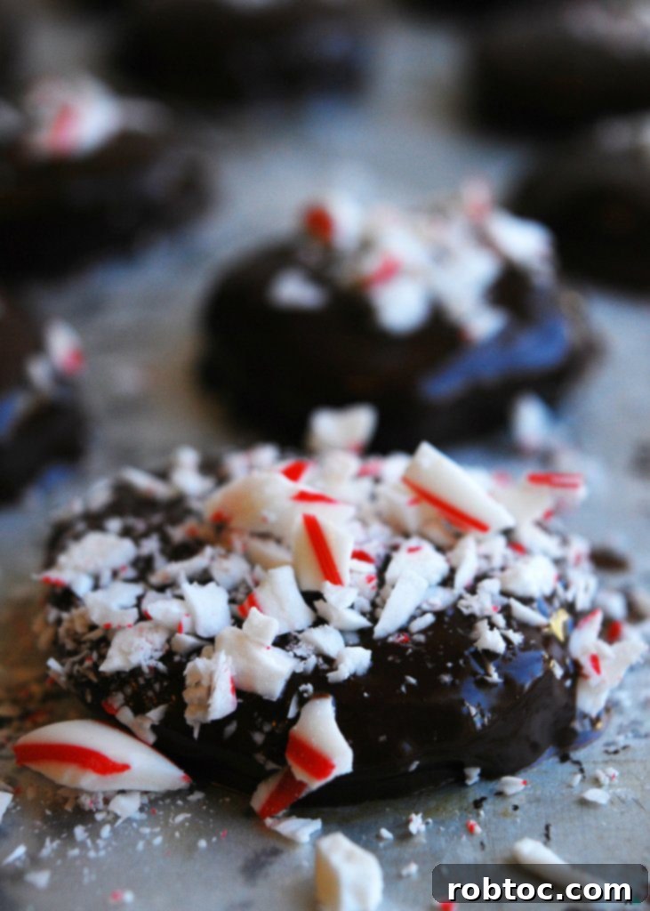 Kids rolling allergy-friendly peppermint patty dough. Gluten-free, dairy-free, vegan holiday dessert recipe.