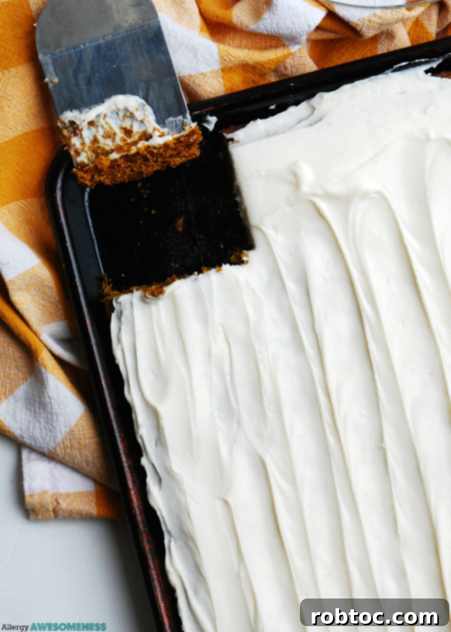 gluten-free-vegan-carrot-sheet-cake-shot-from-above-with-one-piece-missing
