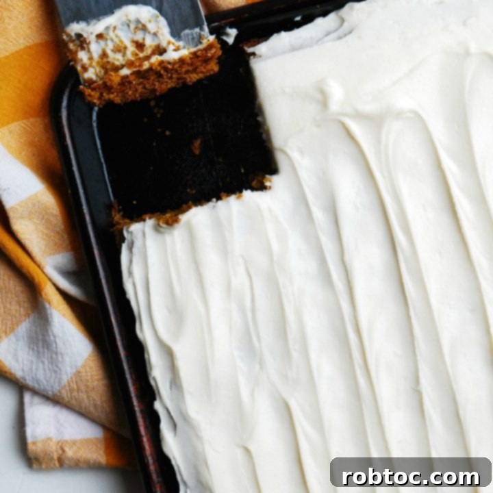 gluten-free-vegan-carrot-sheet-cake-shot-from-above-with-one-piece-missing