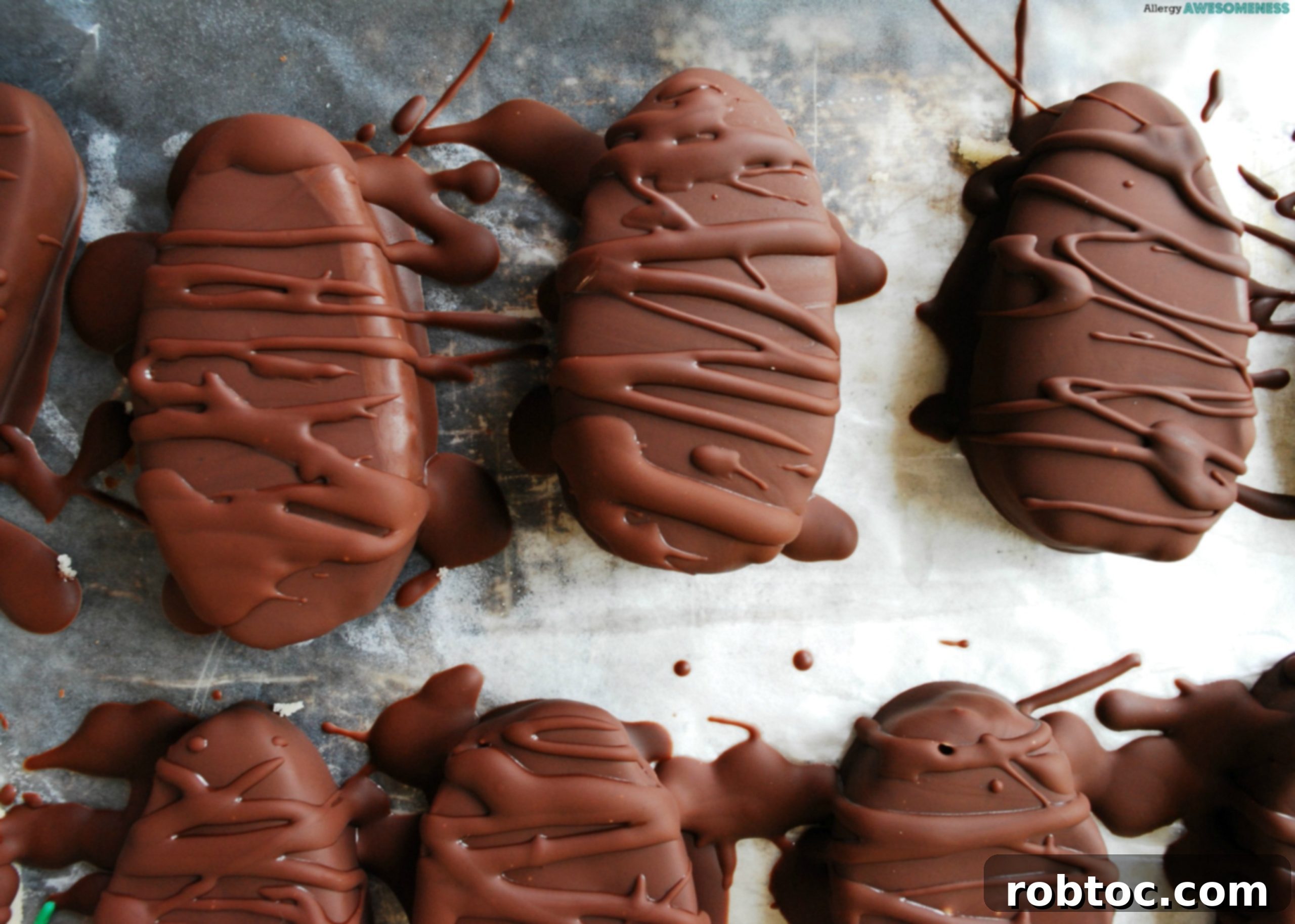 A tray of various allergy-friendly Easter treats, including chocolate-covered eggs.