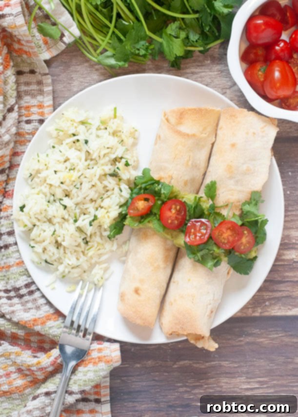 Ultimate Gluten Free Baked Chicken Taquitos 6 gluten-free dairy-free baked chicken taquitos on a plate