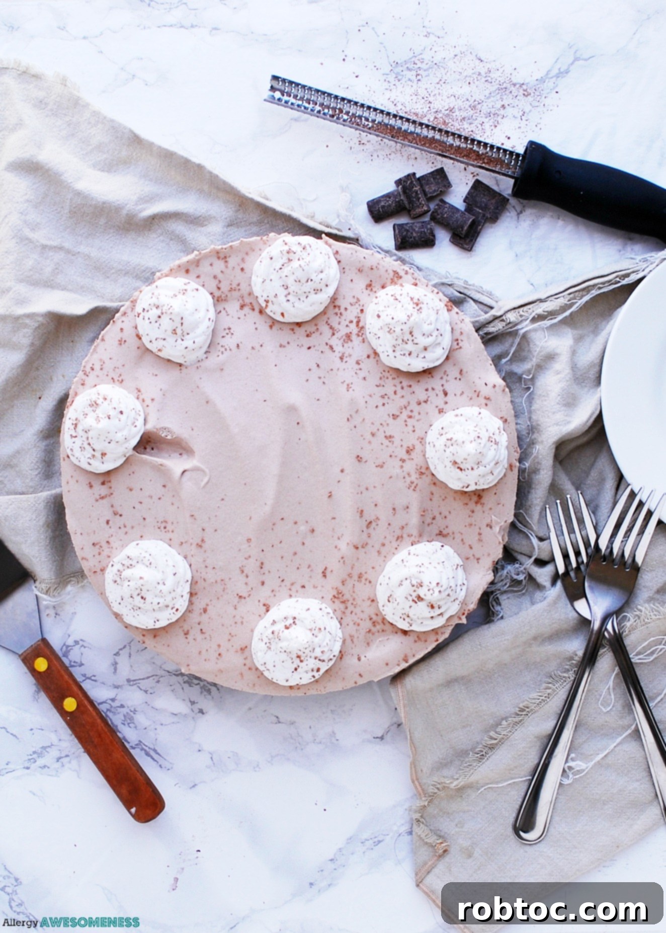 Decadent Vegan Triple Chocolate Pie Free of Gluten, Peanuts, and Tree Nuts 3 Close-up of a gluten-free chocolate pie with a smooth top and golden crust