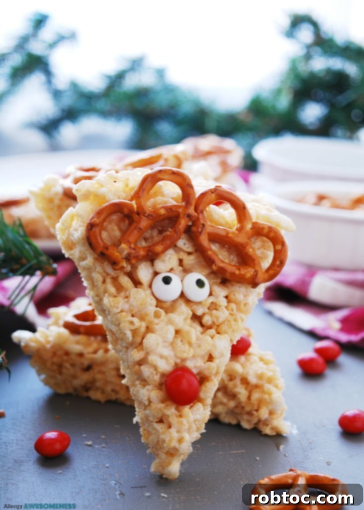 Allergy-Friendly Reindeer Rice Krispie Treats 3 Close-up of a gluten-free Christmas treat: a Reindeer Rice Krispies Square with pretzel antlers and a red nose