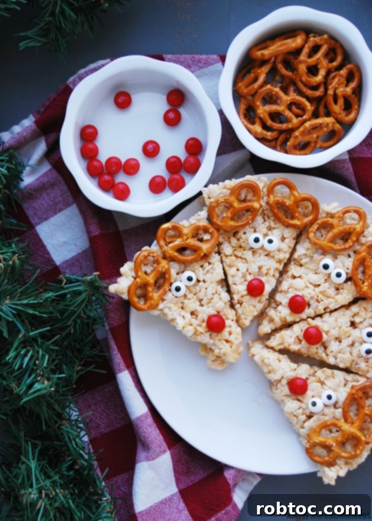 Allergy-Friendly Reindeer Rice Krispie Treats 4 Hand holding an allergy-friendly Christmas treat: a festive Reindeer Rice Krispies square