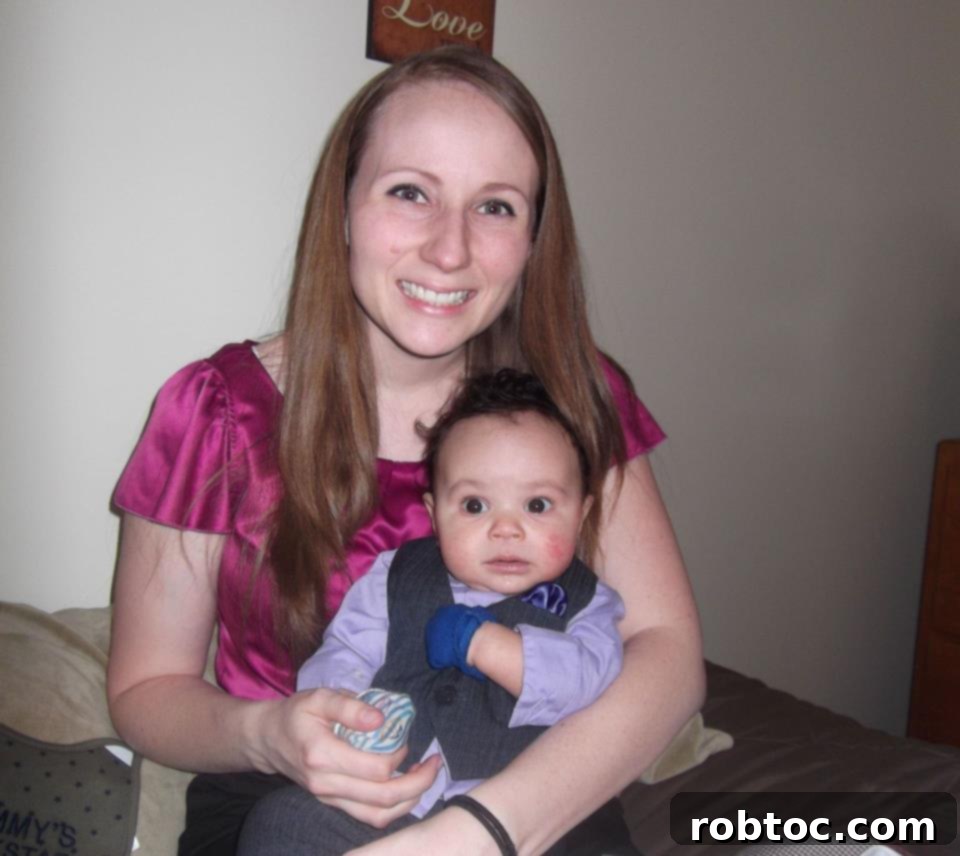 A baby diagnosed with EOE, showing visible rashes on the cheeks which were a key symptom.