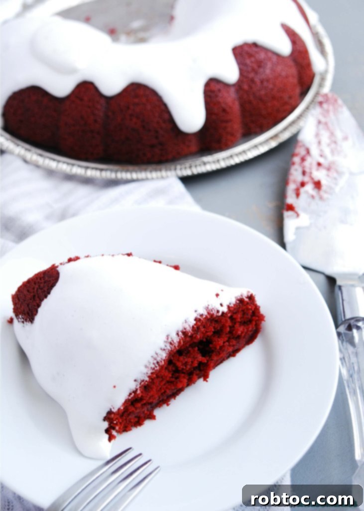 Decadent Gluten-Free Vegan Red Velvet Bundt with Gooey Marshmallow Topping 2 sticky marshmallow frosting on vegan red velvet bundt cake