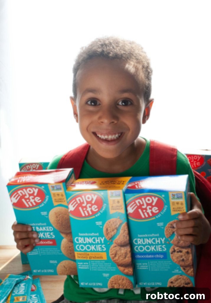Happy kids enjoying Enjoy Life cookies, showcasing the joy of safe and delicious snacks for allergy families.