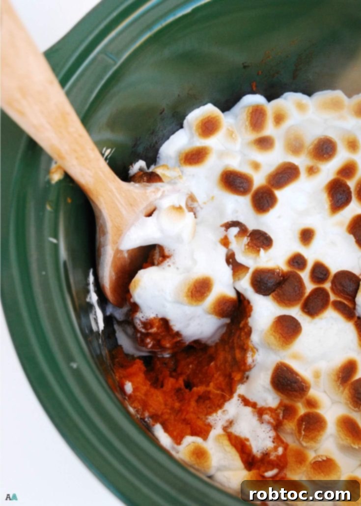 Dairy-free and vegan sweet potato casserole with spoon for Pinterest