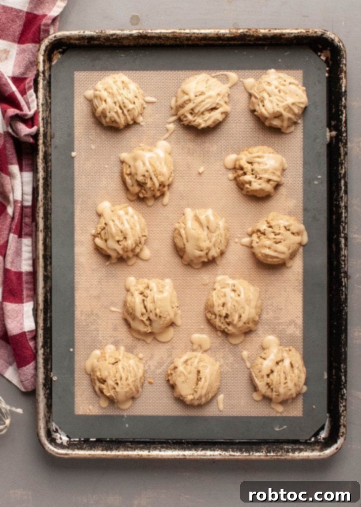 Soft and chewy maple cookies with maple glaze, freshly baked.