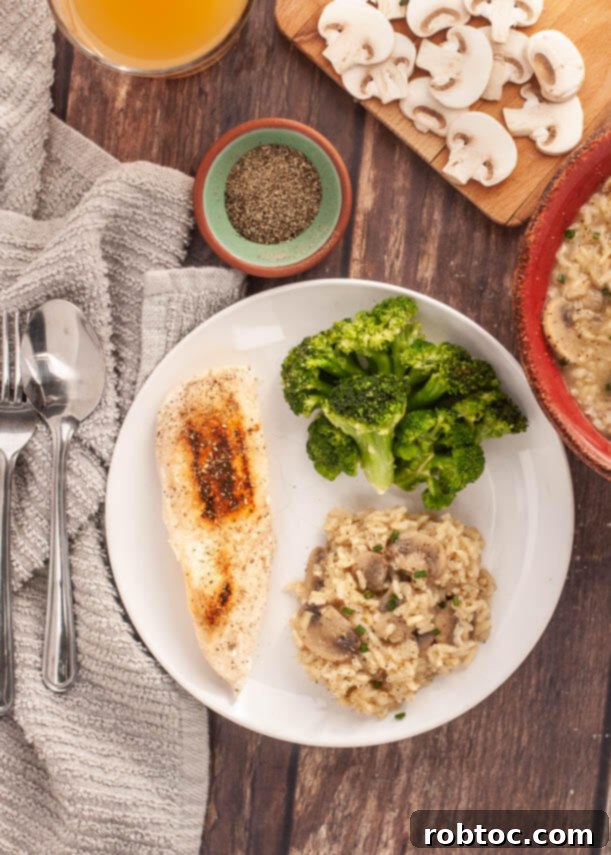 Fluffy and flavorful gluten-free Instant Pot mushroom rice, garnished with fresh chives.