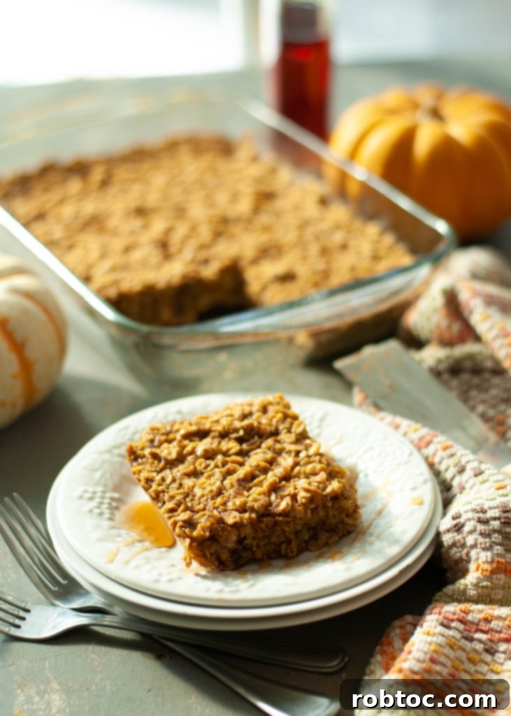 Vegan Gluten Free Baked Pumpkin Oatmeal 3 Gluten-free baked pumpkin oatmeal cut into a square on a white plate