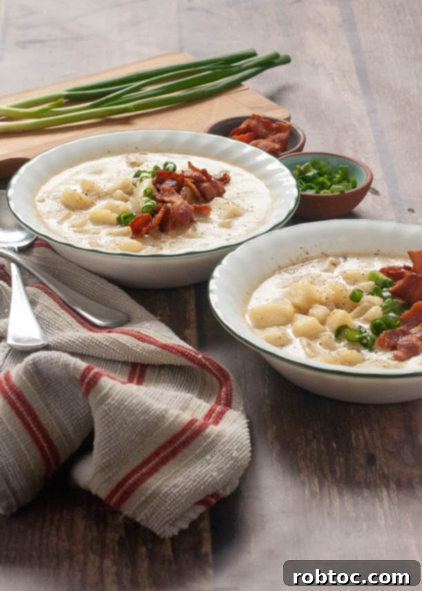 Creamy Instant Pot Loaded Potato Soup Dairy-Free Gluten-Free and Vegan 4 Instant Pot loaded baked potato soup garnished with chives and bacon