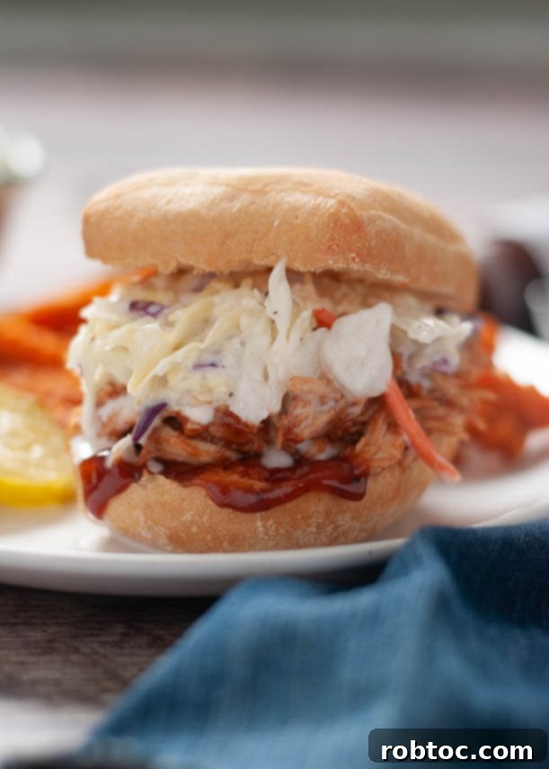 Succulent dairy-free BBQ chicken sliders on a plate, showcasing a delicious and inclusive meal option.