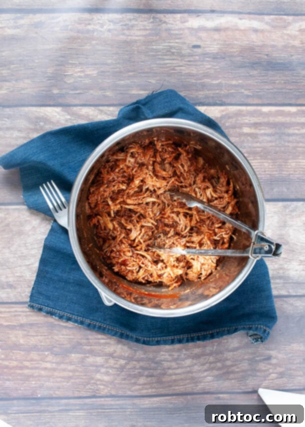 Easy Instant Pot BBQ chicken sliders with sides, a perfect quick meal idea.