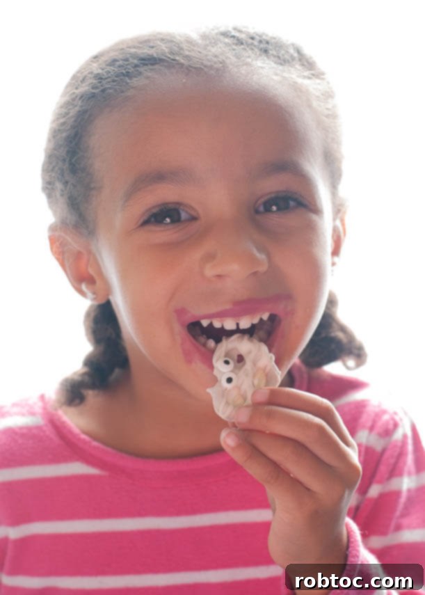 Gluten-Free Dairy-Free Halloween Mummy Pretzels 5 Kid friendly gluten and dairy free Halloween treat for school parties and home
