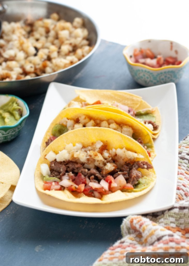 Assortment of dairy-free and gluten-free breakfast tacos with toppings