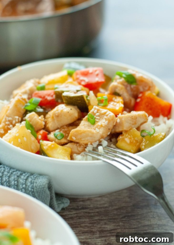 Sweet and Sour Chicken Stir Fry with colorful vegetables