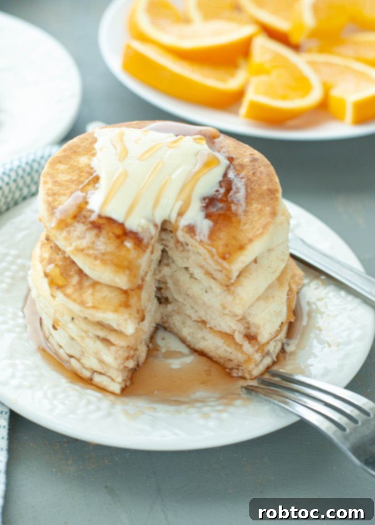 gluten-free-vegan-pancake-stack-with-bite-taken-out-of-it