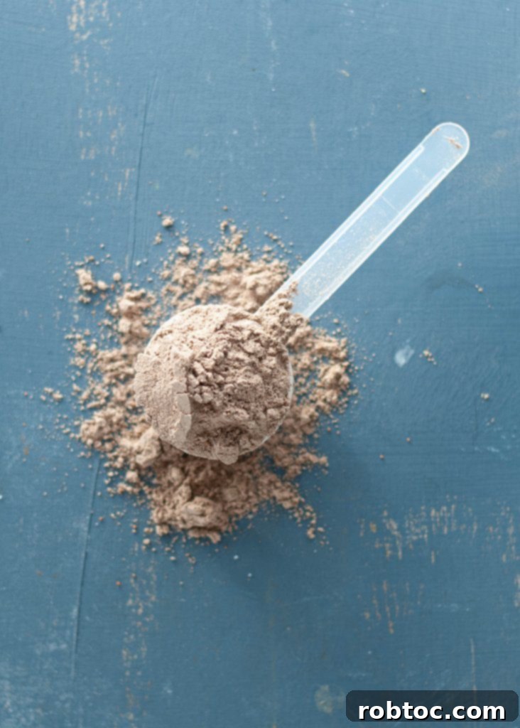chocolate-pea-protein-powder-in-a-scoop