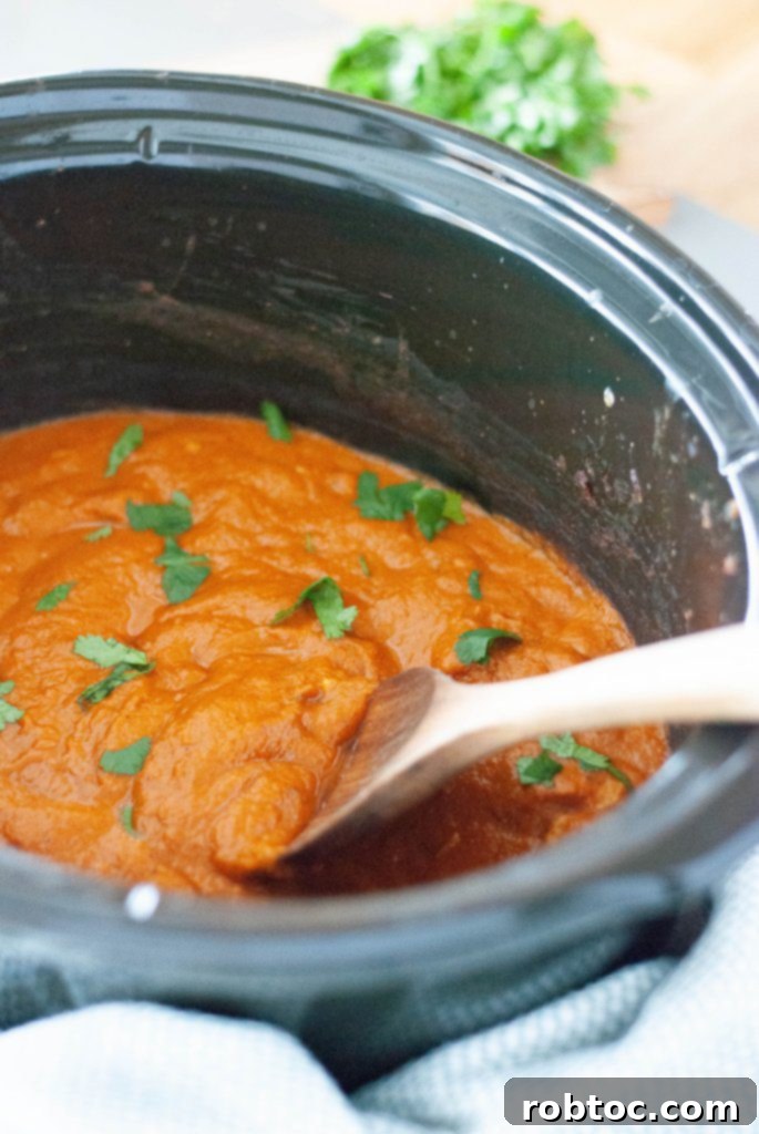Easy chicken tikka masala recipe with coconut milk made in a crock pot, perfect for dinner