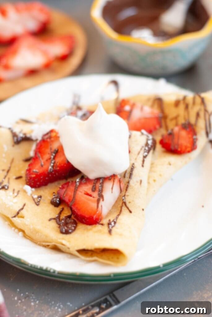 Irresistible Gluten and Dairy Free Crepes 2 gluten-free-dairy-free-crepes-with-strawberries-chocolate-and-whipped-cream