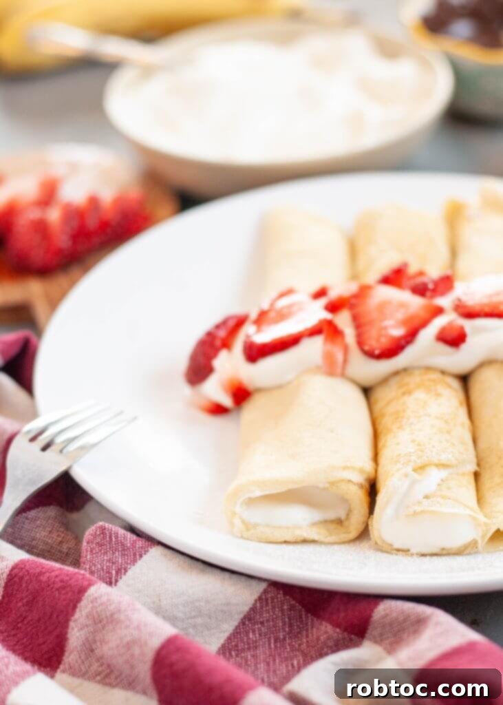 Irresistible Gluten and Dairy Free Crepes 5 gluten-and-dairy-free-crepes-with-cream-and-strawberries-on-top