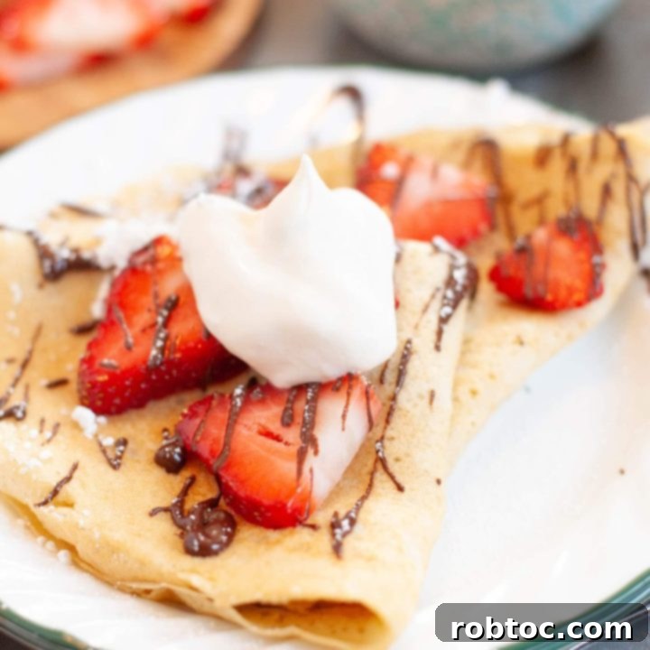gluten-free-dairy-free-crepes-with-strawberries-chocolate-and-whipped-cream
