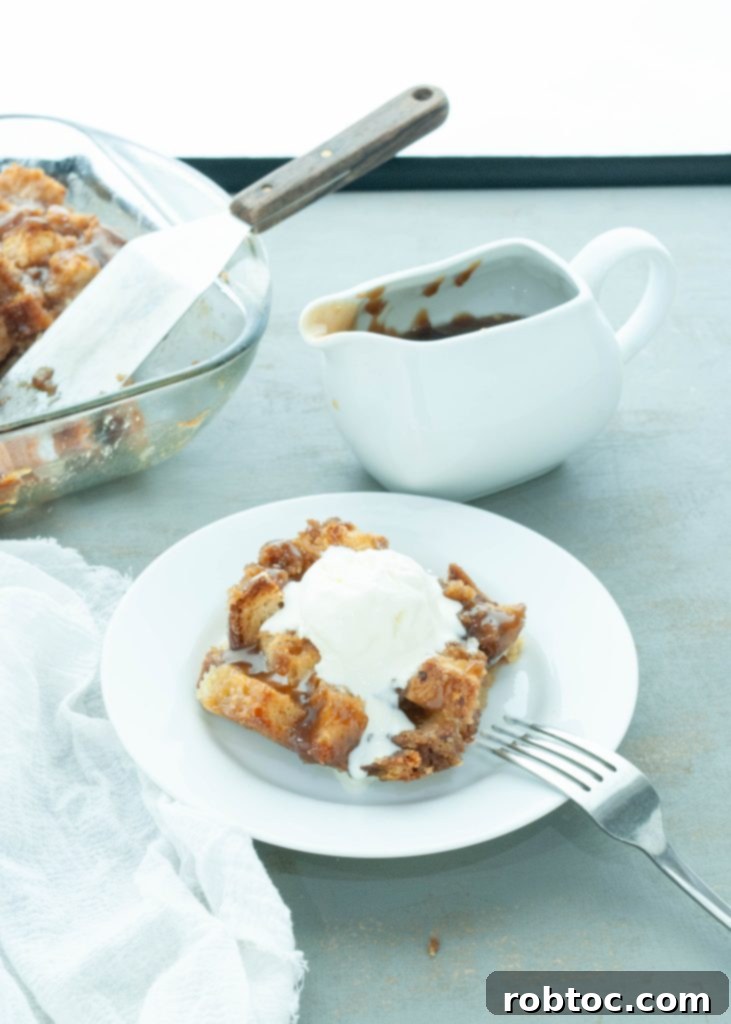 gluten-free-bread-pudding-with-a-slice-on-a-white-plate
