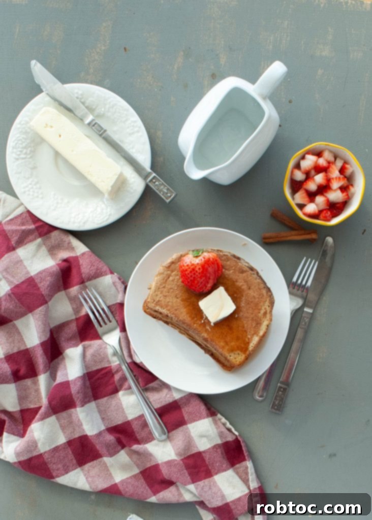 High-Protein Gluten-Free Dairy-Free French Toast 4 french-toast-with-protein-powder-recipe-shot-from-above-with-french-toast-plated-and-strawberries