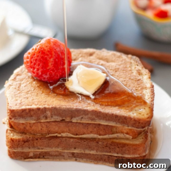 gluten-free-dairy-free-protein-french-toast-with-syrup-dripping-on-it