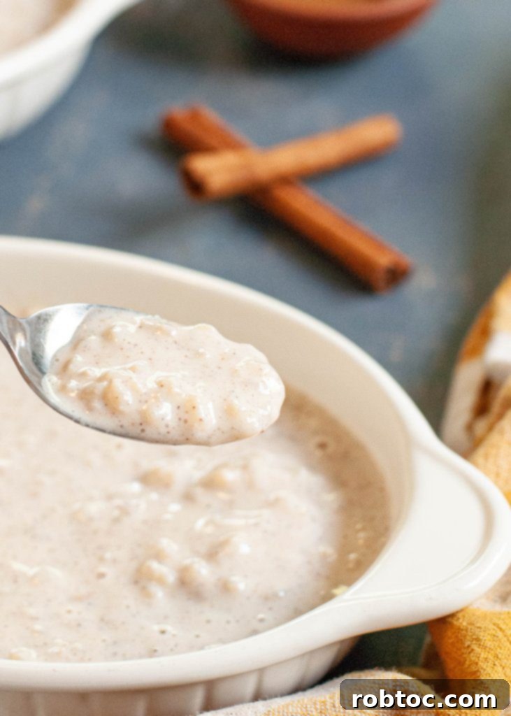 Creamy Gluten-Free Rice Pudding 4 how-to-make-gluten-free-rice-pudding - A pot of rice pudding cooking on the stovetop.