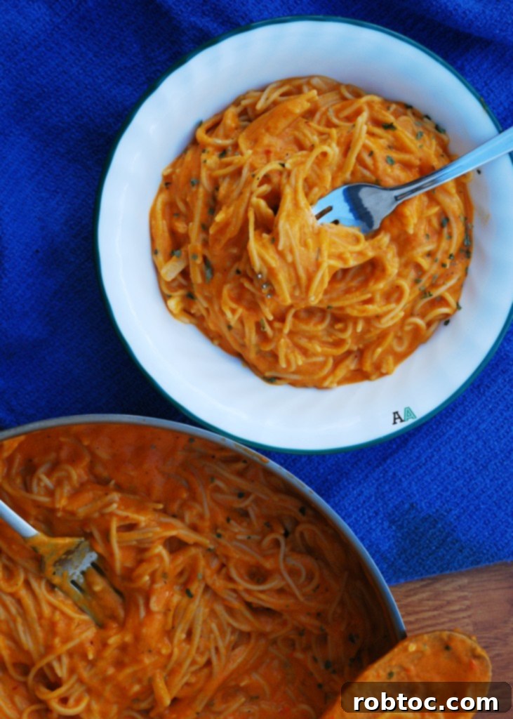 Vibrant Red Pepper Pasta Top 8 Allergen Free and Vegan 4 Overhead shot of a bowl of creamy red pepper pasta, ready to be enjoyed