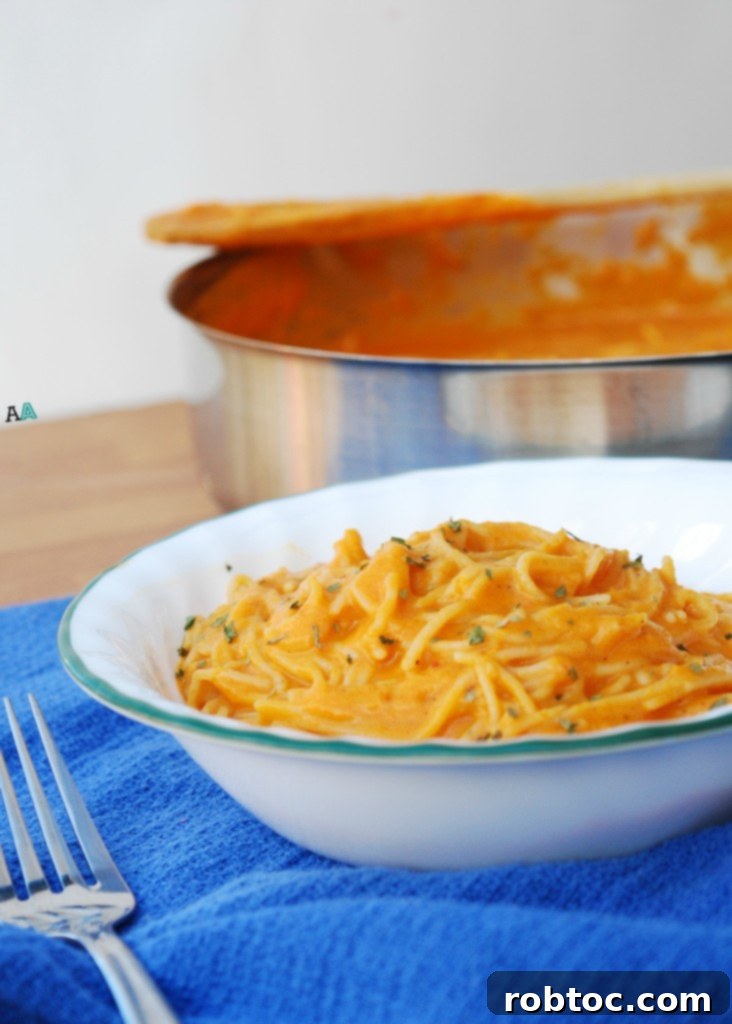 Vibrant Red Pepper Pasta Top 8 Allergen Free and Vegan 5 Elegant side shot of allergy-friendly red pepper pasta in a white bowl