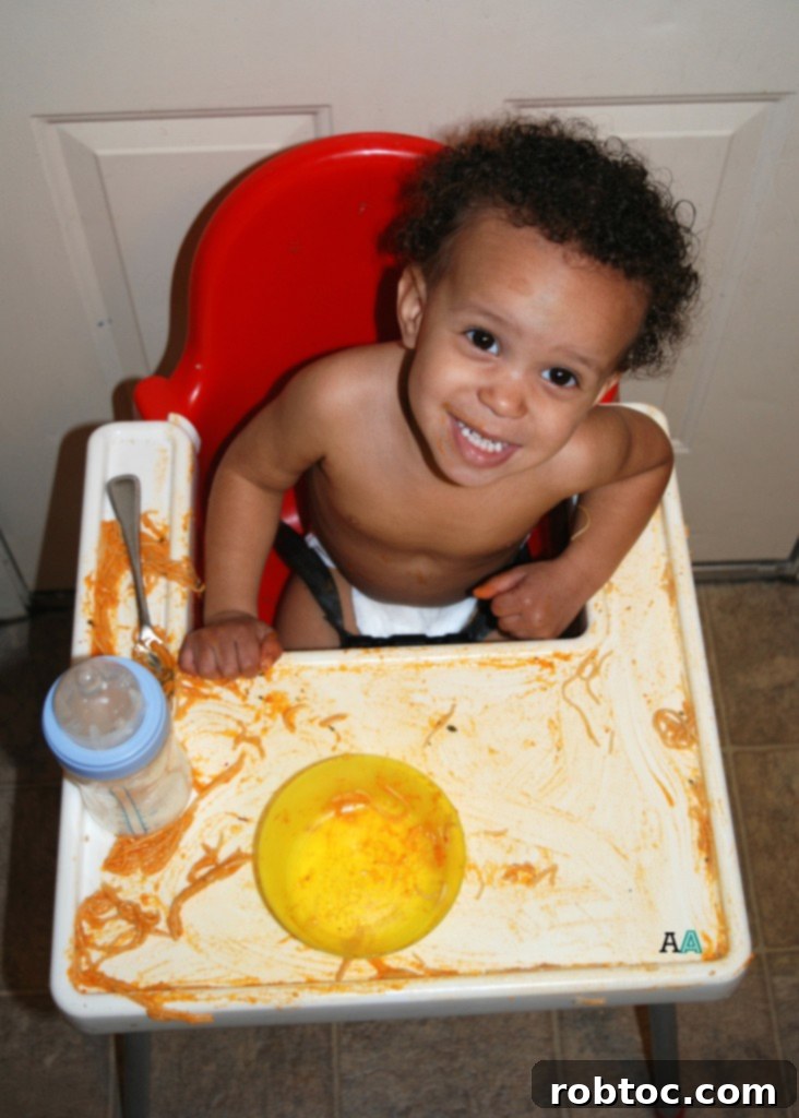 Vibrant Red Pepper Pasta Top 8 Allergen Free and Vegan 8 A baby enjoying (and making a mess with) allergy-friendly red pepper pasta