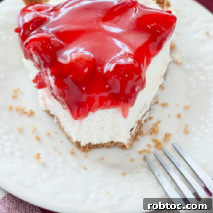 dairy-free-cherry-cheesecake-bitten-on-a-white-plate