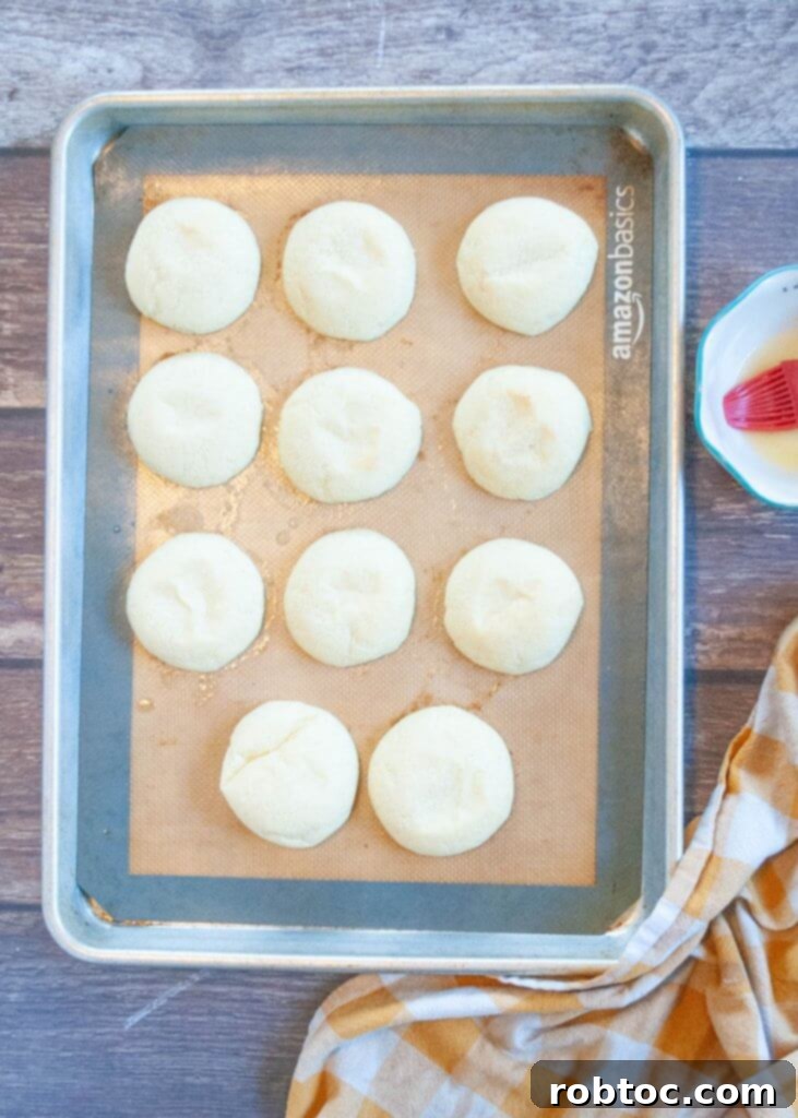 Authentic Pan De Bono Colombian Cheese Bread Recipe Video 5 12 pan de bono on a cookie sheet