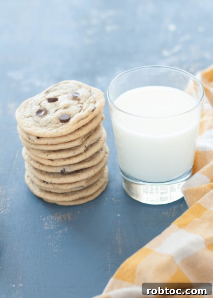 Your New Favorite Gluten-Free Dairy-Free Chocolate Chip Cookies 6 stack-of-gluten-free-dairy-free-chocolate-chip-cookies-next-to-a-glass-of-milk