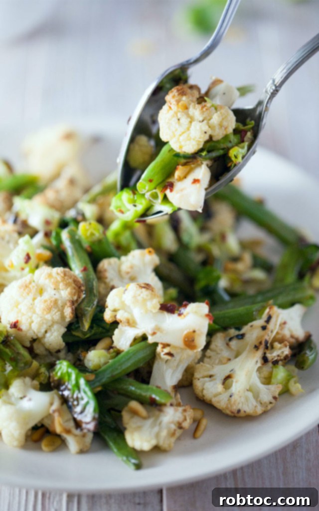 Roasted Cauliflower & Brussels Sprout Salad - A hearty and flavorful vegetable side dish.