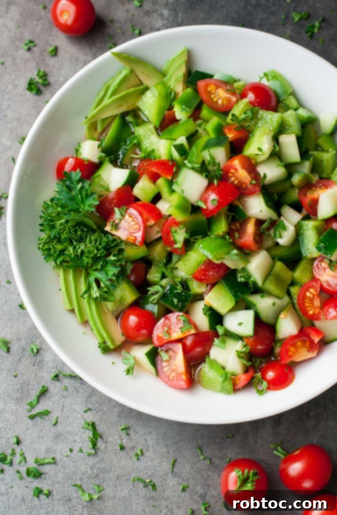 Healthy Tomato Cucumber Avocado Salad - A simple, fresh, and vibrant summer staple.