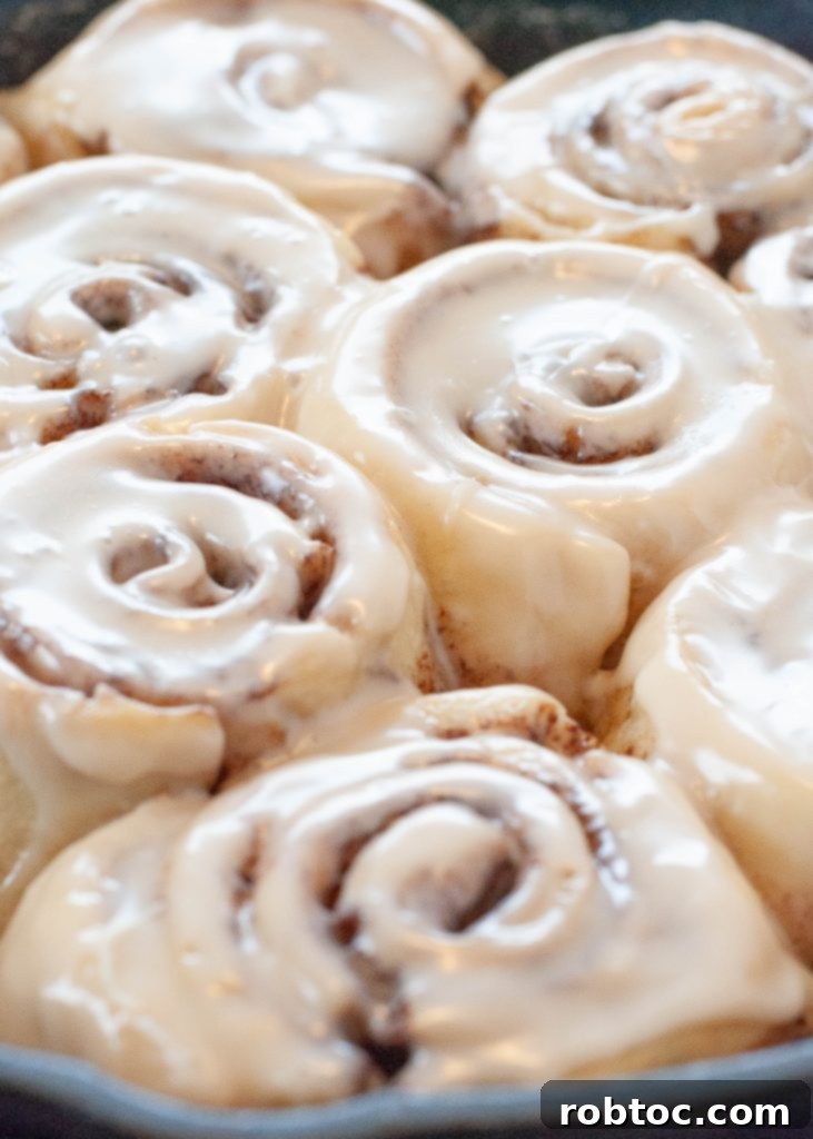 close-up-of-gluten-free-cinnamon-rolls-frosted with white icing