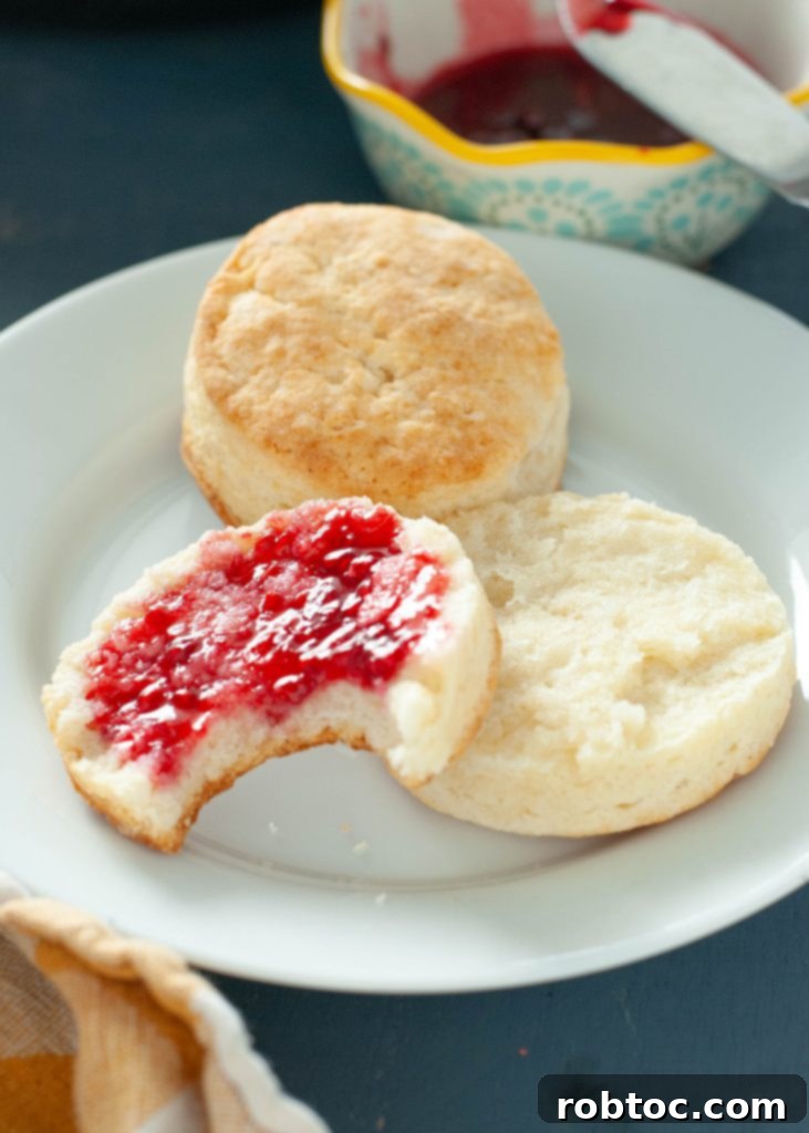 gluten-free-biscuit-cut-in-half-with-raspberry-jam