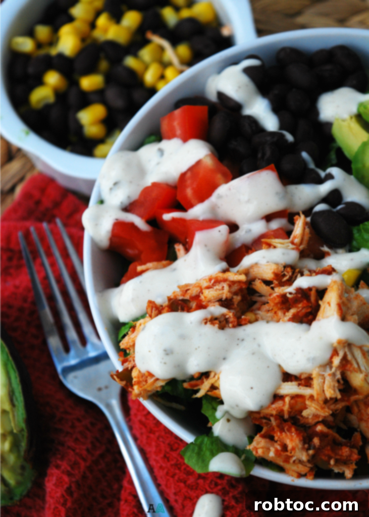 Close-up of a delicious and healthy slow cooker salsa chicken salad, showcasing the tender chicken, fresh vegetables, and vibrant colors, ideal for a gluten-free and top 8 allergen-free diet.