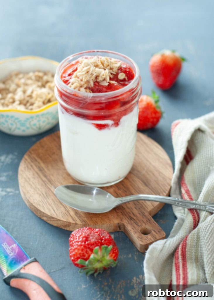greek-yogurt-partfait-with-strawberry-compote-and-granola-on-top