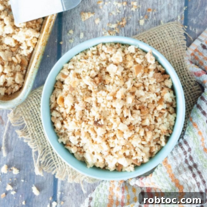 Crispy homemade gluten-free breadcrumbs in a sheet pan, ready to be stored.
