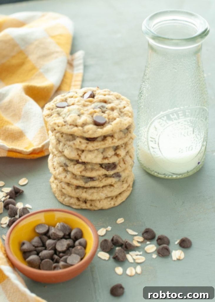 stacked-gluten-free-oatmeal-chocolate-chip-cookies-next-to-a-glass-of-milk